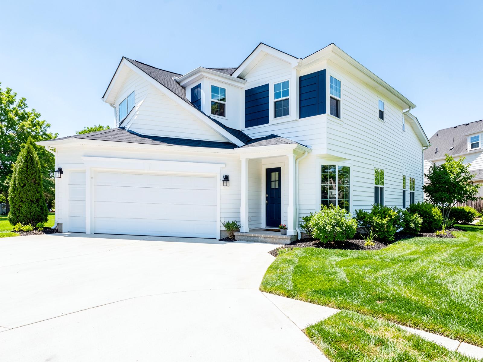 Modern two-story home with freshly painted siding